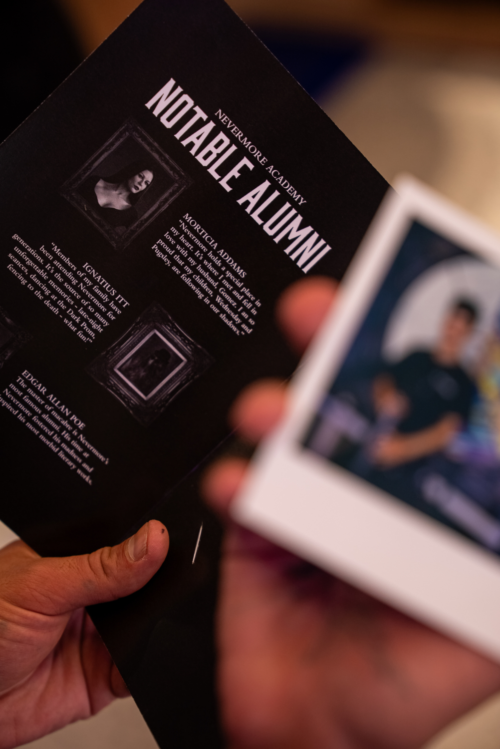 The Nevermore Yearbook with customer Polaroid in